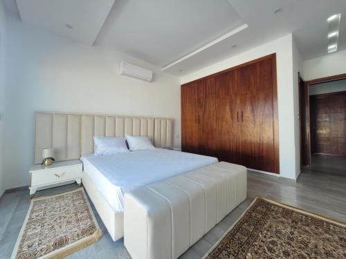 Ένα ή περισσότερα κρεβάτια σε δωμάτιο στο Villa Monika