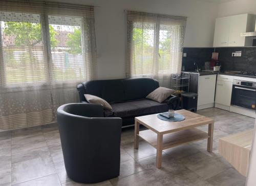 Η κουζίνα ή μικρή κουζίνα στο Appartement meublé