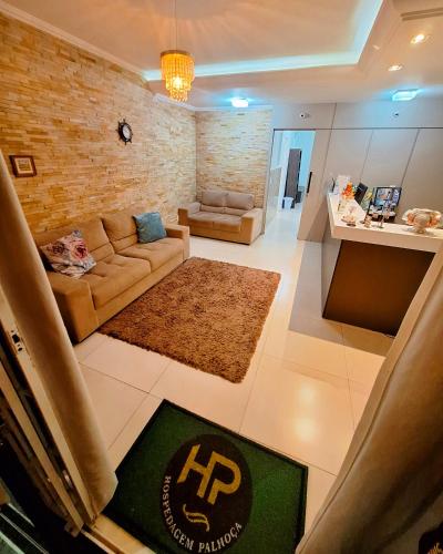 Ein Bett oder Betten in einem Zimmer der Unterkunft Hotel Hospedagem Palhoça