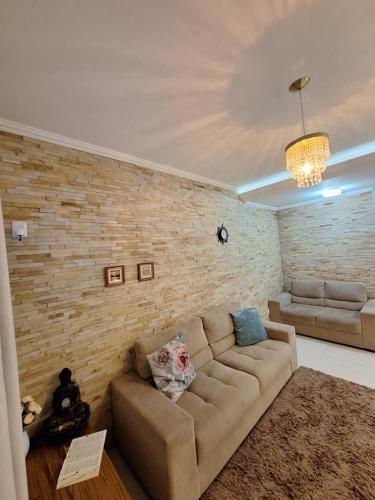 Ein Sitzbereich in der Unterkunft Hotel Hospedagem Palhoça