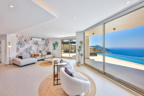 a living room with a view of the ocean at Villa Casa Che in Kalkan
