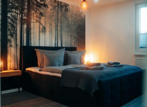 Postel nebo postele na pokoji v ubytování Ferienappartement im Thüringer Wald