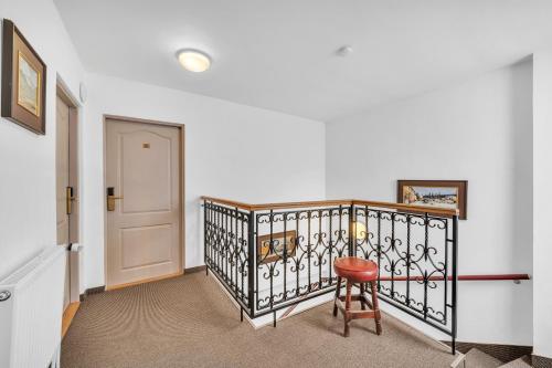 Una cama o camas en una habitación de Hotel Nelly Kellys