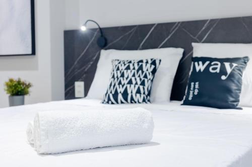 Postel nebo postele na pokoji v ubytování Way Tambaú - Studios Deluxe em João Pessoa por Carpediem