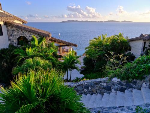 a house with a view of the ocean at The Aerial, BVI in Tortola Island