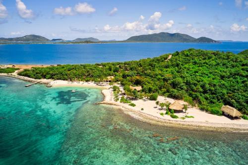 an aerial view of an island in the ocean at The Aerial, BVI in Tortola Island
