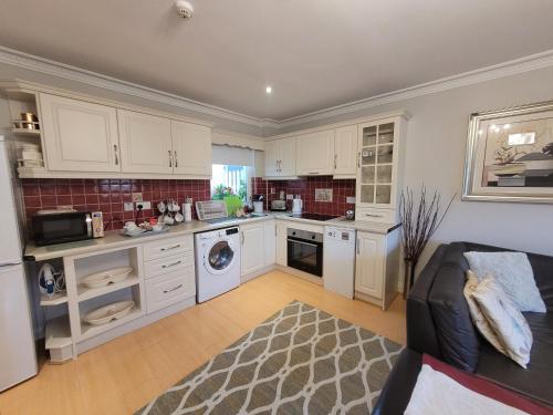 Kuchyň nebo kuchyňský kout v ubytování Connollys Apartment Doohamlet Castleblayney