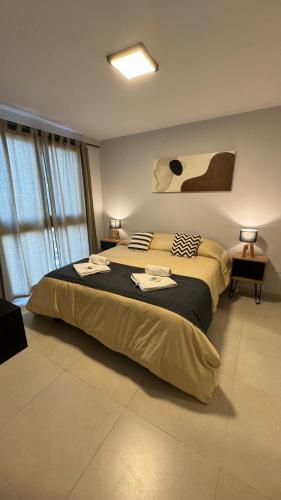 a bedroom with a large bed in a room at Guesthouse Park in Córdoba