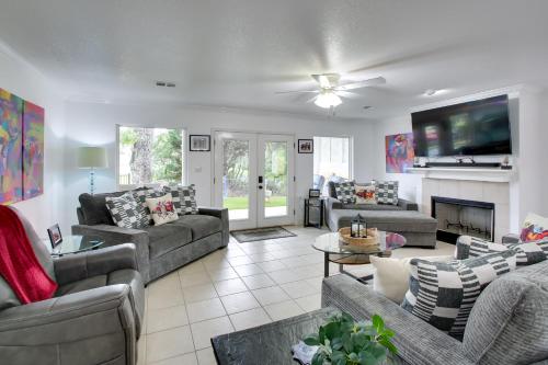 a large living room with couches and a fireplace at Hot Springs Retreat with Fireplace on Lake! in Hot Springs