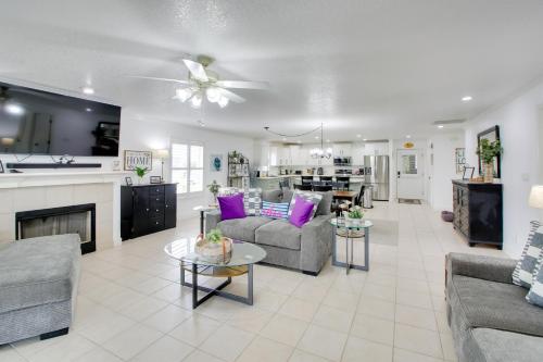 a living room with two couches and a kitchen at Lakefront Hot Springs Condo with Balcony and Fireplace in Hot Springs