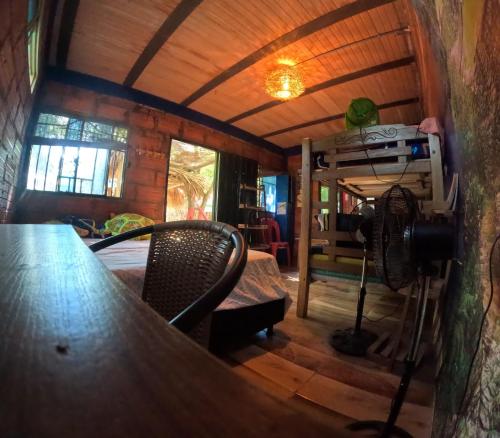 a view of a room with a table and a camera at Bio Coliving Tayrona in Santa Marta