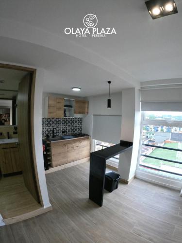Dapur atau dapur kecil di Hotel Olaya Plaza