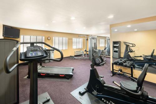 a gym with treadmills and elliptical machines at Best Western Canon City in Canon City