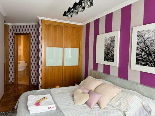 Postel nebo postele na pokoji v ubytování Piso Millenium