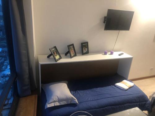 Un televizor și/sau centru de divertisment la Departamento Obelisco para 5 personas