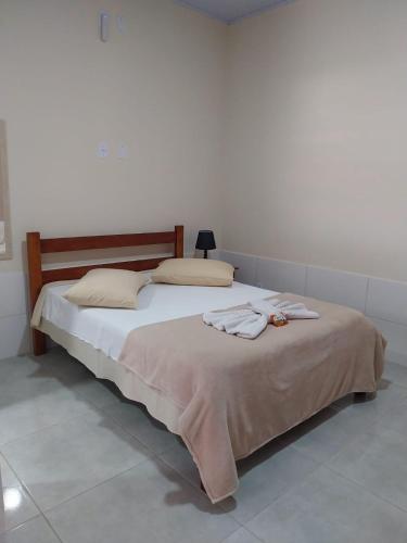 Katil atau katil-katil dalam bilik di Forte Do Pouso Hospedagens