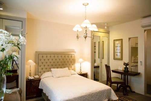 Postel nebo postele na pokoji v ubytování Casa Corp Boutique Suites in Condesa
