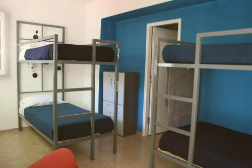 Μία ή περισσότερες κουκέτες σε δωμάτιο στο Antonieta Hostel