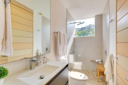 a bathroom with a sink and a toilet at Puerto Vallarta Resort Condo, On-Site Beach Access in Puerto Vallarta