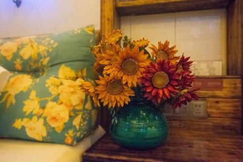 Posezení v ubytování Floral Hotel · Baihui Living Zhangjiajie