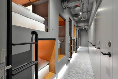 an empty corridor of a subway train at Tiang Capsule in Bangkok