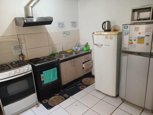 Kuchyň nebo kuchyňský kout v ubytování Hospedaje JM