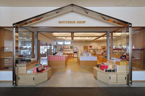 a supermarket shop with awning in the middle at Zao Kokusai Hotel in Zao Onsen