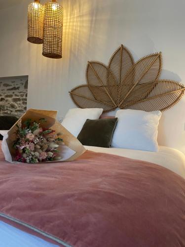 Postel nebo postele na pokoji v ubytování La Petite Grange - Spa Balnéo