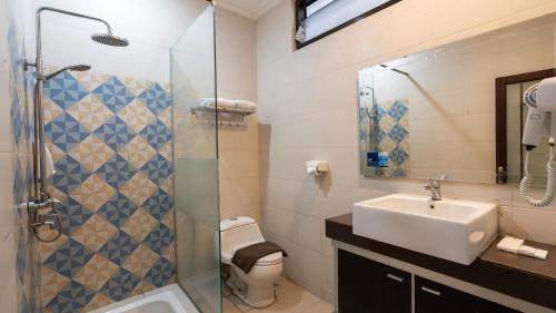 Ένα μπάνιο στο Hotel Selecta Batu Malang