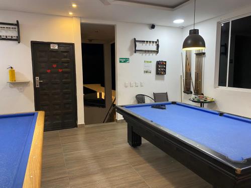 a billiard room with a pool table in it at Hotel deluxe oasis de la colina boutique in Girardot
