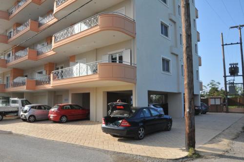 a car parked in front of a building at Philoxenia Hotel in Lefkandi Chalkidas