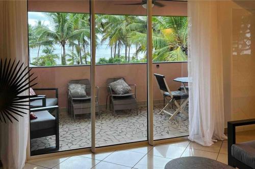 Ein Sitzbereich in der Unterkunft corail vert