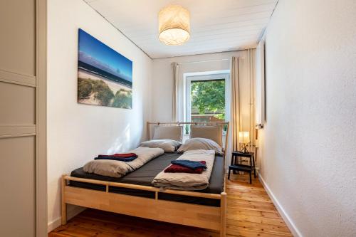 Postel nebo postele na pokoji v ubytování Ferienwohnung am Ostufer