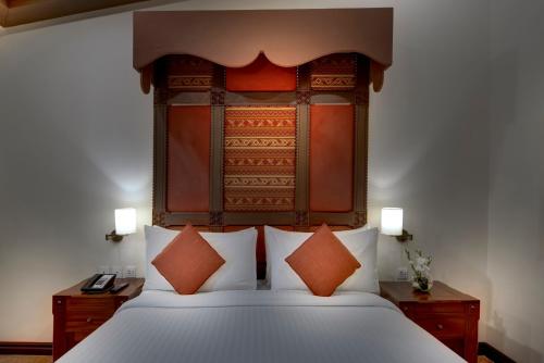 Ένα ή περισσότερα κρεβάτια σε δωμάτιο στο Pearl Continental Hotel Malam Jabba