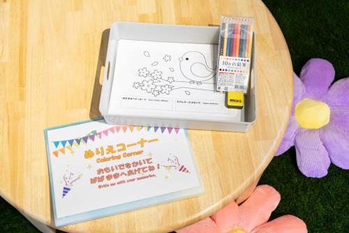 a table with a birthday card and a drawing of a dog at S9W13 LABOINN Large private house in Sapporo