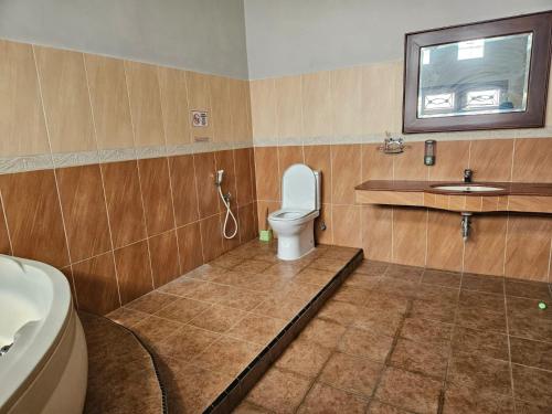 Koupelna v ubytování Nawasena homestay -jepara residence-