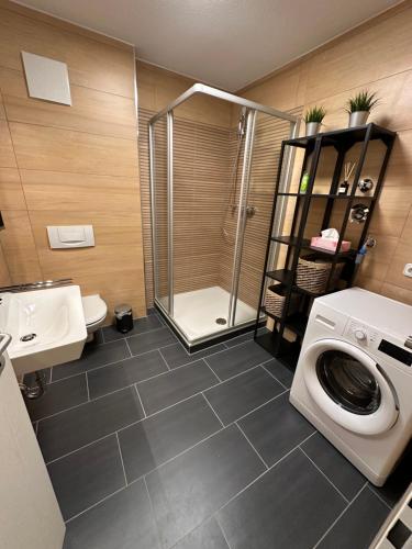 Ένα μπάνιο στο Aix Style Apartments Design Parking