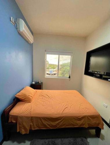 Postel nebo postele na pokoji v ubytování Serenity Apartment