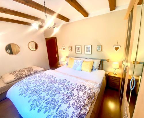 a bedroom with a large bed in a room at Vila EVIO Třeboň in Třeboň