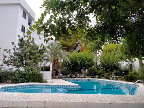 Πισίνα στο ή κοντά στο ESTUDIO EN TRES CARABELAS, PLAYA LAS FUENTES