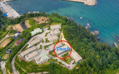 an aerial view of a resort near the water at Samcheok Donghae Raeyo Pension in Samcheok