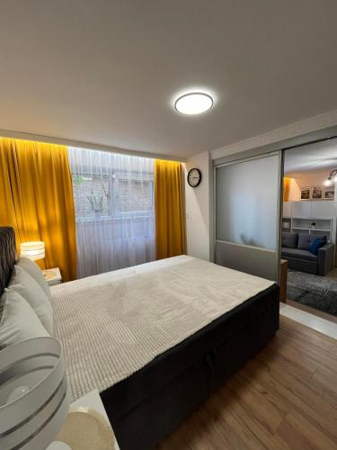Postel nebo postele na pokoji v ubytování Apartament Lena