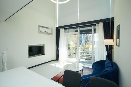 TV a/nebo společenská místnost v ubytování Whity pension