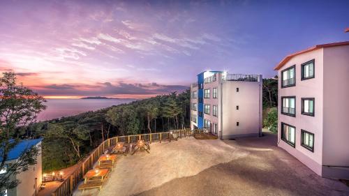 an aerial view of a building with a balcony at Raon Jenahill in Incheon