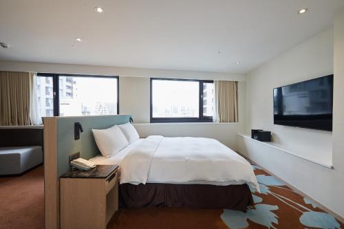 TV a/nebo společenská místnost v ubytování K Hotel Taipei II
