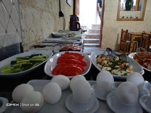 a buffet of food with eggs and vegetables on a table at Ruken Hanım Konağı in Gaziantep