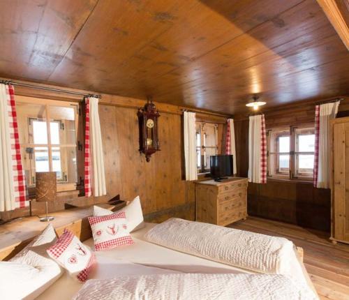 En eller flere senge i et værelse på Hof Alpenjuwel