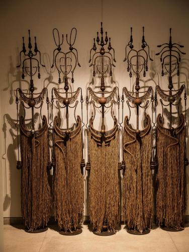 a group of four iron furniture with tassels at Treeline Urban Resort in Siem Reap
