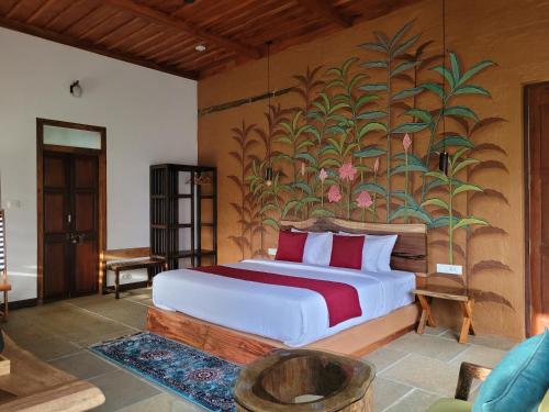 Postel nebo postele na pokoji v ubytování Ananterra Resort Wayanad