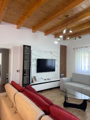 TV a/nebo společenská místnost v ubytování Guest House Mali